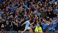 Manchester City’s Portuguese midfielder Bernardo Silva celebrates after scoring the team’s second goal during the UEFA Champions League second leg semi-final football match between Manchester City and Real Madrid at the Etihad Stadium in Manchester, north west England, on May 17, 2023. (Oli SCARFF / AFP)

