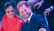 Britain's Meghan, Duchess of Sussex (L) and Britain's Prince Harry, Duke of Sussex, attend the annual One Young World Summit at Bridgewater Hall in Manchester, north-west England on September 5, 2022. (Photo by Oli Scarff / AFP)
 