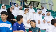 QOC President H E Sheikh Joaan bin Hamad Al Thani, Minister of Education and Higher Education 
 H E Buthaina bint Ali Al Jabr Al Nuaimi and QOC Secretary General Jassim Rashid Al Buenain along with other officials attending Schools Olympic Program competitions at Aspire Dome yesterday. 