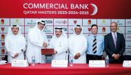 QGA President Hassan Nasser Al Naimi and Commercial Bank EGM, Chief Marketing Officer and Head of CB Premium Banking Hussain Al Abdulla along with other officials during the signing ceremony.   