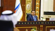 A handout picture released by Iraq's Prime Minister's Media Office shows Iraqi Prime Minister Mohamed Shia al-Sudani attending a meeting with transport ministry representatives in Baghdad on May 27, 2023. (Photo by Iraqi Prime Minister's Press Office / AFP) 