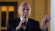Turkish President Tayyip Erdogan addresses his supporters following his victory in the second round of the presidential election at the Presidential Palace in Ankara early on May 29, 2023. Photo by Adem ALTAN / AFP