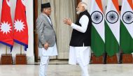 Indian Prime Minister Narendra Modi (right) and Nepal Prime Minister Pushpa Kamal Dahal talk before their meeting at Hyderabad House in New Delhi on June 1, 2023. (Photo by Sajjad Hussain / AFP)