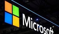 A Microsoft logo is displayed at the MWC (Mobile World Congress) in Barcelona on March 2, 2022. Photo by Josep LAGO / AFP