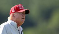 Former US President Donald Trump looks on while playing in the pro-am prior to the LIV Golf Invitational - DC at Trump National Golf Club on May 25, 2023 in Sterling, Virginia. Rob Carr/Getty Images/AFP