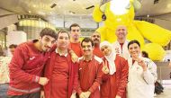 Qatar Special Olympics team athletes and officials pose for a photo prior to their departure.