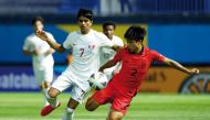 Qatar and South Korea players in action during the AFC U17 Asian Cup match, yesterday.