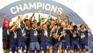  Christian Pulisic #10 of the United States holds up the trophy celebrating the win over Canada during the 2023 CONCACAF Nations League final at Allegiant Stadium on June 18, 2023 in Las Vegas, Nevada.(Photo by Louis Grasse via AFP)