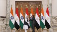 A handout picture released by the Egyptian Presidency on June 25, 2023 shows Egyptian president Abdel Fattah al-Sisi (right) granting the Order of the Nile medal to the Indian Prime Minister Narendra Modi in the capital Cairo. (Photo by AFP)