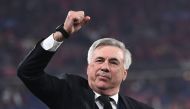 (FILES) Real Madrid's Italian coach Carlo Ancelotti gestures as he celebrates his team's victory during the UEFA Champions League final football match between Liverpool and Real Madrid at the Stade de France in Saint-Denis, north of Paris, on May 28, 2022. (Photo by Anne-Christine POUJOULAT / AFP)
