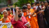 University student activists take part in a demonstration in Maharagama, a suburb of Colombo on July 9, 2023, demanding the release of some of their colleagues in police custody and to mark the first year anniversary of the toppling of former president Gotabaya Rajapaksa. (Photo by Ishara S. KODIKARA / AFP)

