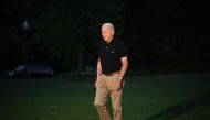 US President Joe Biden walks across the South Lawn upon return to the White House in Washington, DC on July 13, 2023. Biden returned to Washington after a 5-day trip that took him to Britain, Lithuania, and Finland. (Photo by Mandel NGAN / AFP)