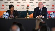FIFA president Gianni Infantino (R) and FIFA Secretary General Fatma Samoura attend a press conference in Auckland on July 19, 2023, ahead of the Women's World Cup football tournament. (Photo by Saeed Khan / AFP)