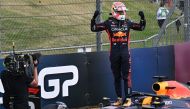 Red Bull Racing's Dutch driver Max Verstappen celebrates after winning the Formula One British Grand Prix at the Silverstone motor racing circuit in Silverstone, central England on July 9, 2023. Photo by ANDREJ ISAKOVIC / AFP