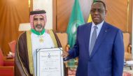 President of the Republic of Senegal H E Macky Sall with the Ambassador of the State of Qatar to Senegal H E Mohammed bin Kurdi Taleb Al Marri during the award presentation.