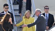 US First Lady Jill Biden (C) is welcomed as she arrives to celebrate the US rejoining UNESCO, at the Orly Airport in Orly, Paris' suburb, on July 24, 2023. (Photo by Alain JOCARD / AFP)