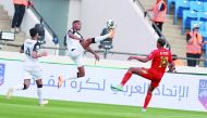 Qatar's Pedro Miguel (left) and Wydad's Montasser Lahtimi in action.
