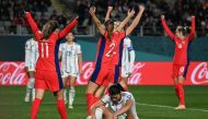 Norway players celebrate their fourth goal scored by Philippines' defender #17 Alicia Barker (bottom) during the Australia and New Zealand 2023 Women's World Cup Group A football match between Norway and the Philippines at Eden Park in Auckland on July 30, 2023. (Photo by Saeed Khan / AFP)