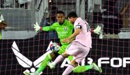 Inter Miami's Argentine forward Lionel Messi (R) scores his team's first goal during the round of 32 Leagues Cup football match between Inter Miami CF and Orlando City SC at DRV PNK Stadium in Fort Lauderdale, Florida, on August 2, 2023. (Photo by Chandan Khanna / AFP)