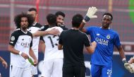 Al Sadd players celebrate after defeating Al Ahli Tripoli on Wednesday.