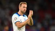 (Files) England's striker Harry Kane applauds fans on the pitch after the UEFA Euro 2024 group C qualification football match between England and North Macedonia at Old Trafford in Manchester, north west England, on June 19, 2023. (Photo by Oli Scarff / AFP) 