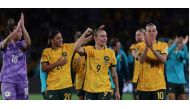 Australia's forward #09 Caitlin Foord (C) celebrates with teammates at the end of their match with Denmark at Stadium Australia in Sydney on August 7, 2023. (Photo by Steve Christo / AFP)

