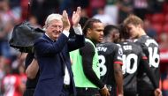 Crystal Palace's English manager Roy Hodgson (L) applauds fans on the pitch after the English Premier League football match between Sheffield United and Crystal Palace at Bramall Lane in Sheffield, northern England on August 12, 2023. Palace won the game 1-0. (Photo by Darren Staples / AFP)