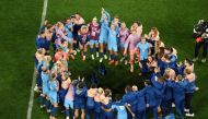 England's team celebrates winning the Australia and New Zealand 2023 Women's World Cup semi-final football match between Australia and England at Stadium Australia in Sydney on August 16, 2023. (Photo by David Gray / AFP)