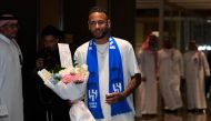 Brazilian forward Neymar arrives to Riyadh on August 18, 2023 after signing for Al-Hilal on a two-year contract. (Photo by AFP)
