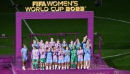 England's players stand on the podium after receiving the runners up medals after the Australia and New Zealand 2023 Women's World Cup final football match between Spain and England at Stadium Australia in Sydney on August 20, 2023. (Photo by Saeed KHAN / AFP)