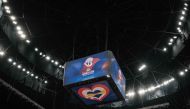 Screens show the logo of the FIBA Basketball World Cup during a training session at Indonesia Arena in Jakarta on August 24, 2023. (Photo by Yasuyoshi Chiba / AFP)