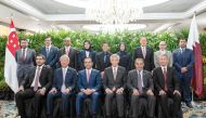 Prime Minister and Minister of Foreign Affairs H E Sheikh Mohammed bin Abdulrahman bin Jassim Al Thani (third left) and Prime Minister of Singapore H E Lee Hsien Loong (third right) with other ministers and officials from the two countries on the occasion of Qatar-Singapore High-Level Joint Committee meeting in Singapore yesterday.
