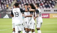 Al Sadd's Akram Afif celebrates with teammates.
