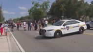 This video grab shows police cars on the site of a shooting in Jacksonville, Florida, August 26, 2023. (Photo by AFP)

