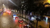 A general view of a flooded street after heavy rainstorms triggered a 'Black Rainstorm Warning' from the city's weather observatory, in Hong Kong on September 7, 2023. (Photo by Matt Surrusco / AFP)