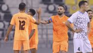 Umm Salal captain Andy Delort (centre) celebrates with teammate Khaled Abdelraouf Alzrigi after the match.