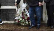 Relative attend the funeral of a victim of a cyclone that hit Roca Sales, Rio Grande do Sul, Brazil, during his funeral in the city's cemetery, on September 9, 2023. Photo by SILVIO AVILA / AFP