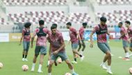 Qatar players in action during a training session at Khalifa International Stadium, yesterday.