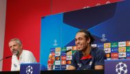 Leipzig's German head coach Marco Rose (L) and Leipzig's Danish forward #09 Yussuf Poulsen attend a press conference on the eve of the UEFA Champions League football match between RB Leipzig and Manchester City in Leipzig, on October 3, 2023. (Photo by Odd Andersen / AFP)