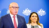 Shadow minister for Indigenous Australians Jacinta Nampijinpa Price (R) and Opposition Leader Peter Dutton attend a press conference following the results of Australia's historic Indigenous rights referendum, in Brisbane on October 14, 2023. (Photo by Patrick Hamilton / AFP)