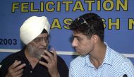 (Files) In this file photo taken on April 4, 2003, former India's cricket captain and spinner Bishan Singh Bedi (L) speaks with fast bowler Ashish Nehra during a felicitation ceremony in New Delhi. (Photo by Ravi Raveendran / AFP)