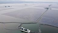 This aerial picture shows the newly built floating solar power plant on the water at Cirata Reservoir, West Java, on November 9, 2023, shortly before being inaugurated by President Joko Widodo. (Photo by Bay Ismoyo / AFP)