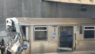 Handout photos provided by the Chicago Fire Department on November 16, 2023, show workers examining the damage to a CTA train in Chicago, Illinois. Photo by HANDOUT / Chicago Fire Department / AFP