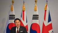 South Korea's President Yoon Suk Yeol delivers a speech at the Royal Society in London on November 22, 2023, on the second day of a three-day state visit to the UK. Photo by TOBY MELVILLE / POOL / AFP
