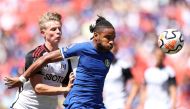 (FILES) Christopher Nkunku of Chelsea is challenged by Luc De Fougerolles of Fulham during the Premier League Summer Series match between Chelsea FC and Fulham FC at FedExField on July 30, 2023 in Landover, Maryland. Tim Nwachukwu/Getty Images/AFP

