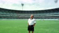 (FILES) Late Australian football coach Terry Venables surveys the vast Melbourne Cricket Ground on November 27, 1997 where Australia who are favourites will play Iran to decide the final team to advance to the 1998 World Cup in France. (Photo by NEWS LTD / AFP)
