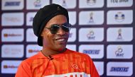 Former Brazilian football player Ronaldinho speaks to AFP during the World Teqball Championships at the Bangkok Arena in Bangkok on December 3, 2023. (Photo by Lillian Suwanrumpha / AFP)
