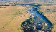 Aerial view of the Rupununi Savannah in western Guyana, near the border with Brazil and Venezuela, taken on April 12, 2023. (Photo by Martin SILVA / AFP)
