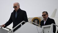 File: US President Joe Biden, with son Hunter Biden, arrives at Hancock Field Air National Guard Base in Syracuse, New York, on February 4, 2023. (Photo by Andrew Caballero-Reynolds / AFP)