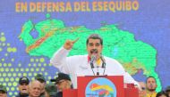 This handout picture released by the Venezuelan Presidency shows Venezuela's President Nicolas Maduro speaking during a meeting outside the Miraflores Presidential Palace in Caracas on December 8, 2023. (Photo by MARCELO GARCIA / Venezuelan Presidency / AFP) 